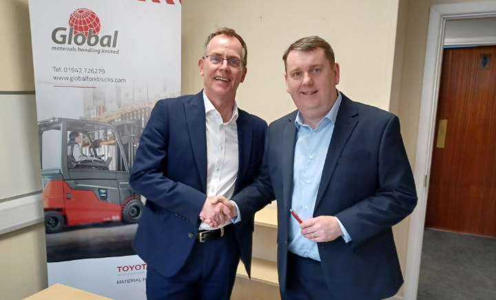 Photo of Toyota's Nick Duckworth (left) and Global's Andy Evans (right) as Global Materials Handling Become the Official Toyota Dealer for the North West of England